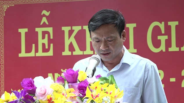 Đồng chí Nguyễn Văn Bình - Phó Bí thư Huyện ủy, Chủ tịch UBND huyện đọc thư của Chủ tịch nước